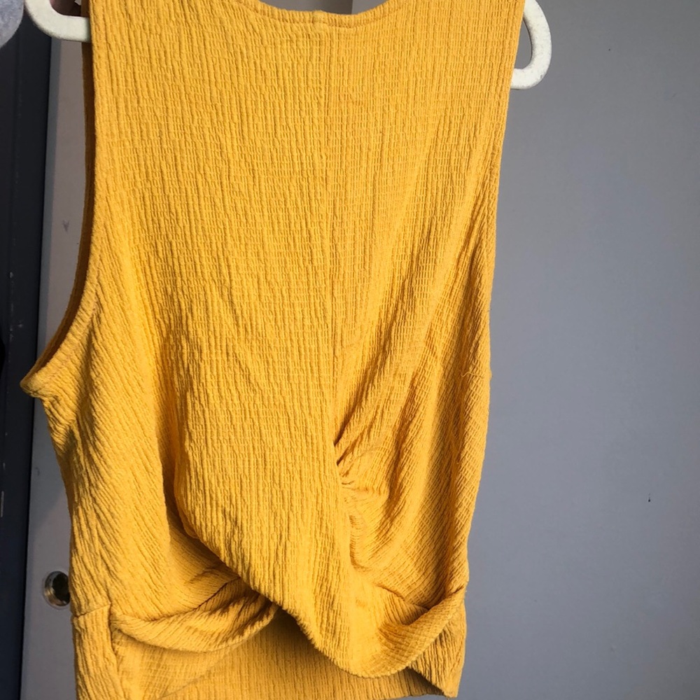 yellow tank top with swirl